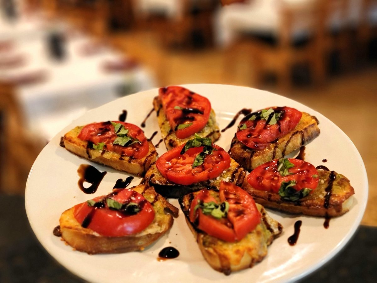 Bruschetta — grilled bread with diced tomato, basil and balsamic